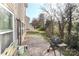 View of a brick patio with grill and bench seating, perfect for outdoor relaxation and entertaining at 1135 Valley St, Statesville, NC 28677