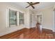 Bright bedroom with hardwood floors and natural light streaming through the windows at 119 E End Ave, Statesville, NC 28677