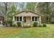 Charming bungalow with inviting front porch, manicured landscaping, and lots of curb appeal at 119 E End Ave, Statesville, NC 28677