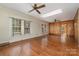 Bright living area with gleaming hardwood floors, skylight, and great natural light at 119 E End Ave, Statesville, NC 28677
