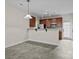 Modern kitchen showcasing stainless steel appliances, granite countertops, and a convenient breakfast bar at 12550 Mcgrath Dr, Charlotte, NC 28269