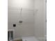 Functional laundry room with washer and dryer hookups and convenient overhead shelving for storage at 12550 Mcgrath Dr, Charlotte, NC 28269