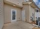 Private outdoor patio space perfect for grilling or relaxing and an external storage closet at 12550 Mcgrath Dr, Charlotte, NC 28269