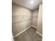 Walk-in closet with shelving provides plenty of storage space at 1406 Mason St, Kannapolis, NC 28081