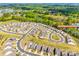 An aerial view of the beautiful 1625 Carolina Orchards Blvd neighborhood, surrounded by lush trees and well-manicured lawns at 1625 Carolina Orchards Blvd, Fort Mill, SC 29715