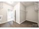 Walk-in closet with wood floors and wire shelving, creating an organized and spacious storage area at 1625 Carolina Orchards Blvd, Fort Mill, SC 29715