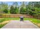 Grassy backyard and patio ideal for outdoor enjoyment at 200 Boysenberry Dr, China Grove, NC 28023