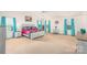 Spacious bedroom with vaulted ceiling, large windows and seating area at 200 Boysenberry Dr, China Grove, NC 28023