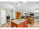 Open kitchen view showcasing an island with seating and easy access to the living room at 200 Boysenberry Dr, China Grove, NC 28023