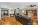 Spacious living room with hardwood floors, ceiling fans, and ample natural light at 200 Boysenberry Dr, China Grove, NC 28023