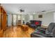 Bright living room with hardwood floors and neutral paint, creating a welcoming atmosphere at 200 Boysenberry Dr, China Grove, NC 28023