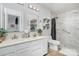 Clean bathroom with a double sink vanity and tiled walk-in shower at 2005 Dunsmore Ln, Waxhaw, NC 28173