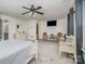 Spacious bedroom with seating, TV and neutral color scheme at 2005 Dunsmore Ln, Waxhaw, NC 28173