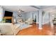 Inviting living room features a fireplace, hardwood floors, and neutral color palette at 2005 Dunsmore Ln, Waxhaw, NC 28173