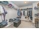 Spacious walk-in closet with built-in shelving and ample storage at 2005 Dunsmore Ln, Waxhaw, NC 28173