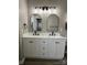 Modern bathroom with a double vanity, updated lighting, and plenty of counter space at 2006 Cramerton Village Dr # 31-D, Cramerton, NC 28032