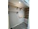 The closet provides open, built-in shelving, providing ample storage solutions for the space at 2006 Cramerton Village Dr # 31-D, Cramerton, NC 28032