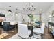 An open dining area between the kitchen and living room at 2038 Sandhurst Dr, Charlotte, NC 28205