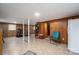 Functional basement area with tile floor, paneled walls, and versatile space at 205 Gamble Ave, Bessemer City, NC 28016