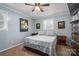 Comfortable bedroom with soft carpet, complemented by matching side tables and artwork at 205 Gamble Ave, Bessemer City, NC 28016
