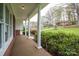 Inviting front porch with stately columns and a serene view of the landscaped yard at 205 Gamble Ave, Bessemer City, NC 28016