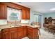 Kitchen featuring granite countertops and classic wood cabinetry at 205 Gamble Ave, Bessemer City, NC 28016