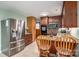 Kitchen with stainless steel appliances and cozy breakfast bar at 205 Gamble Ave, Bessemer City, NC 28016