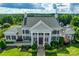 Stunning aerial view of the stately home showcasing meticulous landscaping and architectural details at 2052 Donaldson St, Indian Land, SC 29707