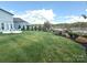 Lush backyard with professionally landscaped greenery, perfect for outdoor enjoyment at 2052 Donaldson St, Indian Land, SC 29707