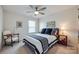 Comfortable bedroom featuring a full bed, neutral decor, and natural light from a window creating a relaxing atmosphere at 2052 Donaldson St, Indian Land, SC 29707