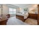 Spacious bedroom boasting a king-size bed, tray ceilings, and stylish furnishings offering comfort and elegance at 2052 Donaldson St, Indian Land, SC 29707
