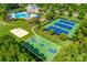 An aerial view shows the pool, tennis courts, volleyball court, and basketball court in this community at 2052 Donaldson St, Indian Land, SC 29707