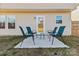 Cozy patio area features comfortable seating, perfect for outdoor relaxation and entertaining guests at 213 Morton St, Shelby, NC 28152