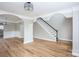 Spacious living area with staircase and hardwood floors at 240 Bluffton Rd, Mooresville, NC 28115
