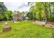 Expansive backyard with lush lawn, garden, and outdoor living spaces, offering a serene retreat at 2470 Highway 557 Rd, Clover, SC 29710