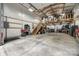 Wide shot of garage with shelving, tools, equipment, and large loft space at 2470 Highway 557 Rd, Clover, SC 29710