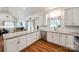 Bright kitchen with granite countertops, white cabinets, and stainless steel appliances at 2470 Highway 557 Rd, Clover, SC 29710