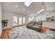 Bright living area with hardwood floors, skylights and neutral paint at 2470 Highway 557 Rd, Clover, SC 29710