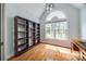 Home office featuring a large window, built-in bookshelves, and hardwood floors at 2470 Highway 557 Rd, Clover, SC 29710