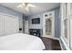 Bedroom with private access to the sunroom at 252 Greyfriars Rd, Mooresville, NC 28117