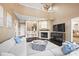 Bright living room with high ceilings, fireplace, large windows, and a comfortable sectional sofa at 252 Greyfriars Rd, Mooresville, NC 28117