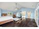 Spacious main bedroom boasting high ceilings, hardwood floors, and plenty of natural light at 252 Greyfriars Rd, Mooresville, NC 28117