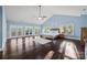 Expansive main bedroom featuring high vaulted ceilings and access to an outdoor deck at 252 Greyfriars Rd, Mooresville, NC 28117