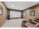 Home theater with a large screen, comfortable seating, and surround sound speakers at 252 Greyfriars Rd, Mooresville, NC 28117