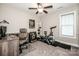 Bedroom with a desk, an exercise bike, and natural light from the window at 2676 Poplar Cove Nw Dr, Concord, NC 28027