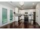 Modern kitchen featuring stainless steel appliances, white cabinets and a kitchen island at 2676 Poplar Cove Nw Dr, Concord, NC 28027