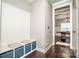Practical mudroom featuring built-in storage and seating at 2676 Poplar Cove Nw Dr, Concord, NC 28027