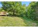 This backyard provides ample space for entertaining and enjoyment with a wooden deck at 2945 Christian Scott Ln, Charlotte, NC 28214