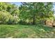 Lush backyard featuring a wooden deck, perfect for outdoor living and relaxation at 2945 Christian Scott Ln, Charlotte, NC 28214