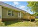 This backyard is ready to be enjoyed, complete with a deck and lush greenery at 2945 Christian Scott Ln, Charlotte, NC 28214
